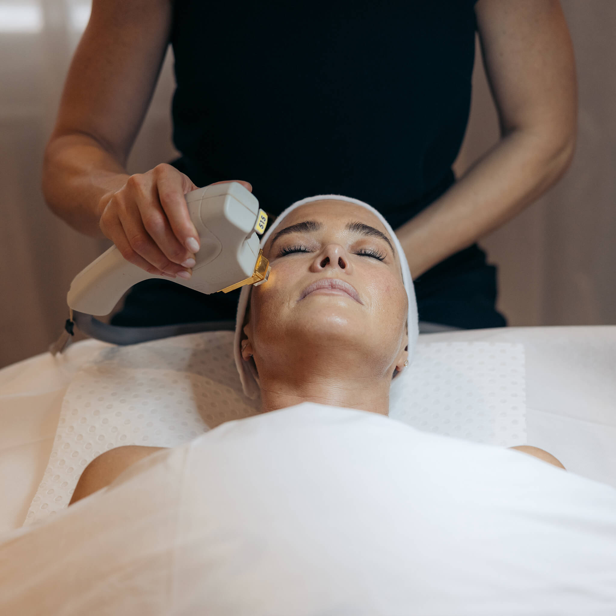 Woman receiving BBL laser at All Saint Clinic Sydney by our trained professional Doctor or Dermal Therapist