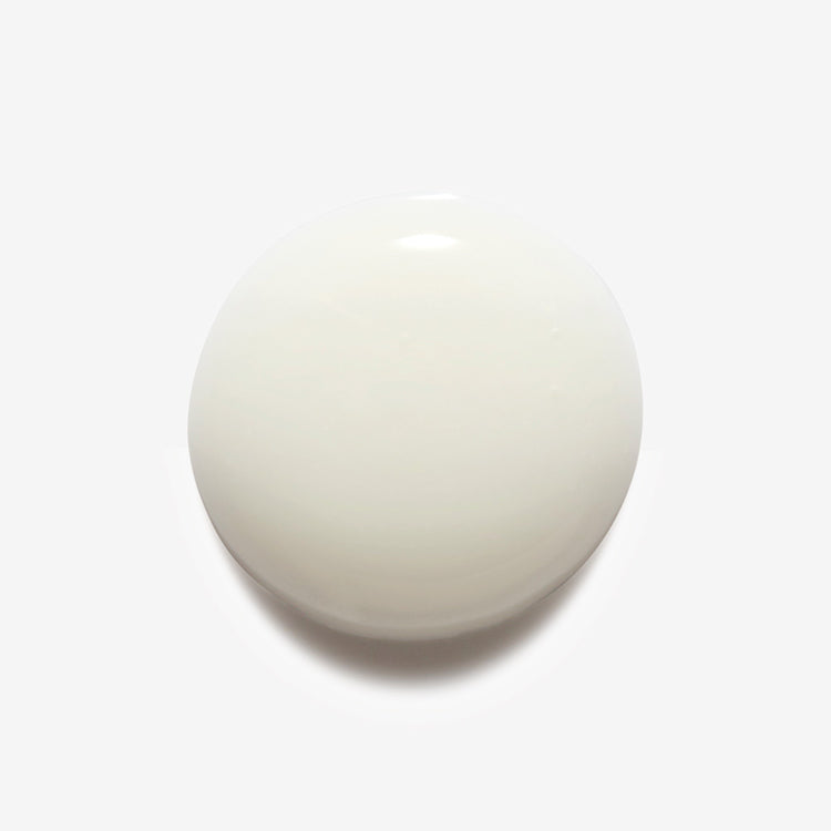 A white circular drop of SERUM Swatch