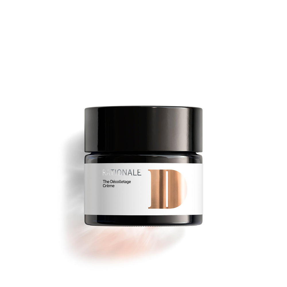 Dark glass jar of RATIONALE The Décolletage Crème