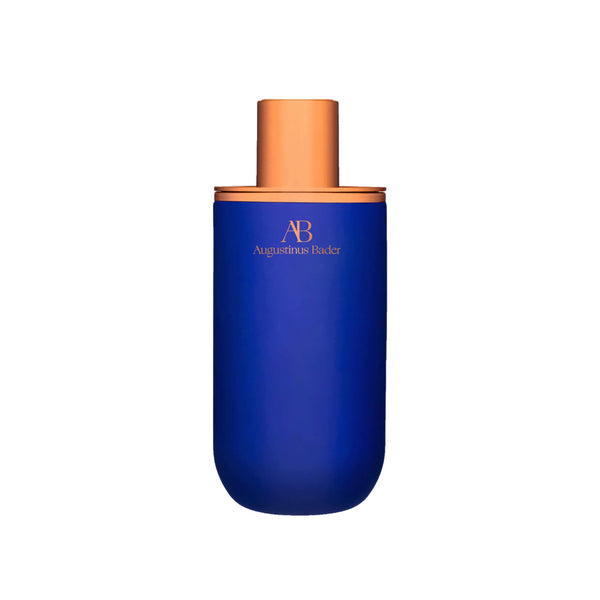 Blue bottle with bronze cap on a white background