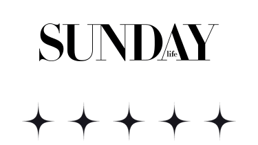All Saint Skin Clinic sign with the word Sunday in dark lettering on a black background