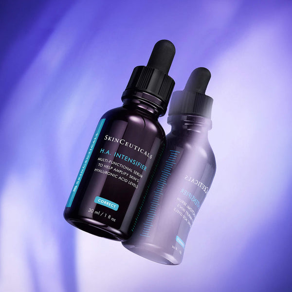 skinceuticals HAIntensifier serum bottle with droppers on a purple gradient background